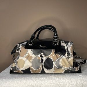 Like new ! Coach signature cloth with patent leather trim.